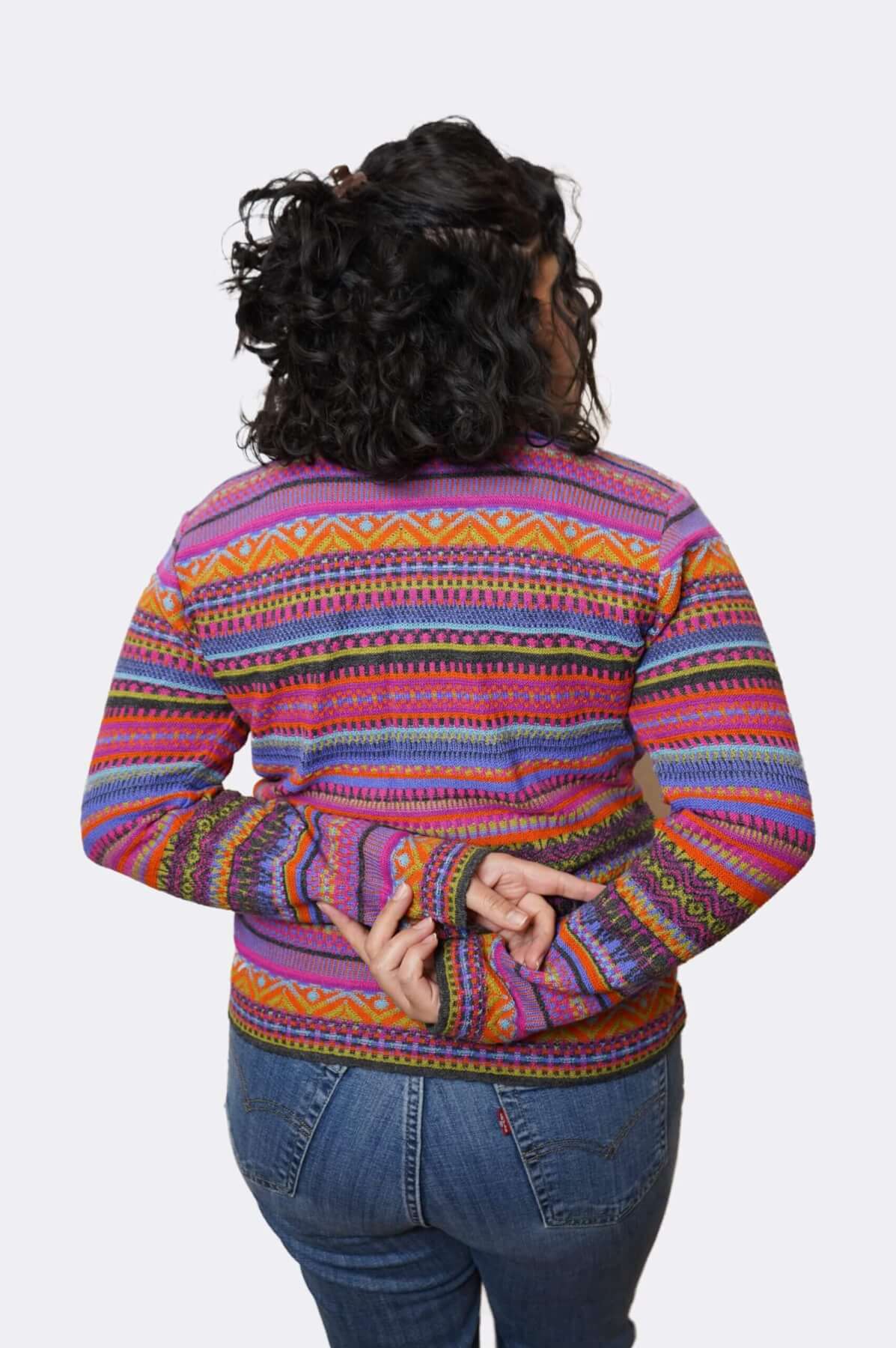Women's alpaca cardigan back view - colorful striped knit detail