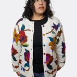 Baby alpaca floral cardigan front view - hands behind back